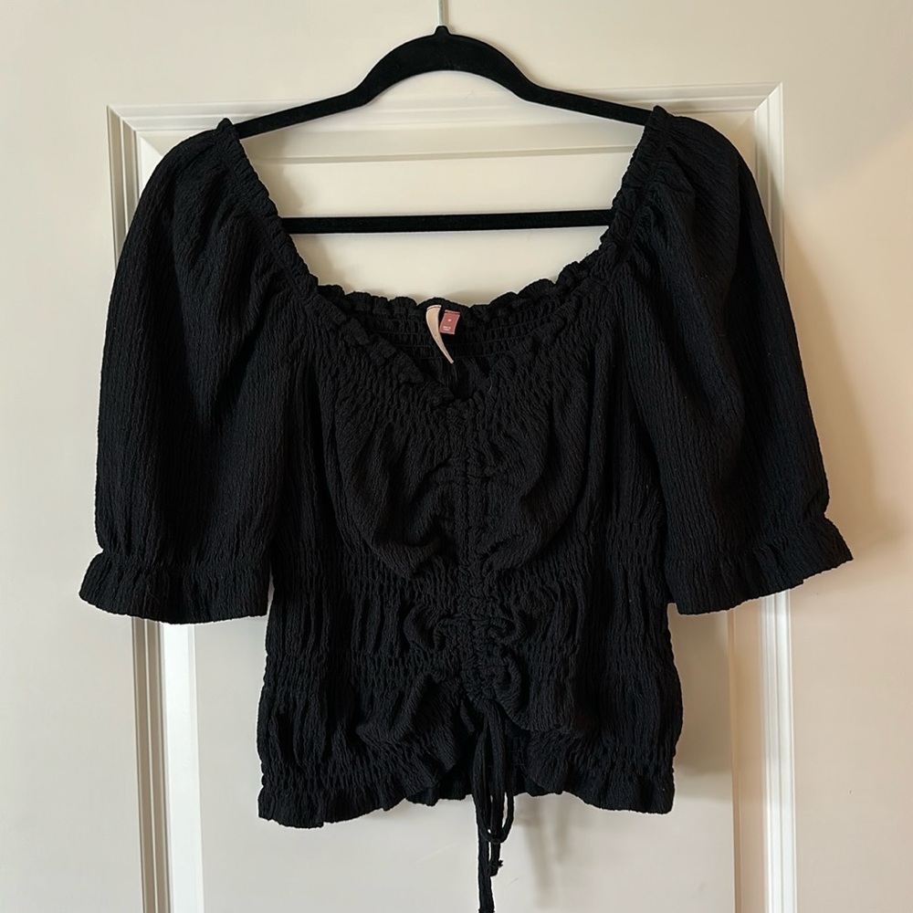 Black puff sleeve blouse from Pilcro